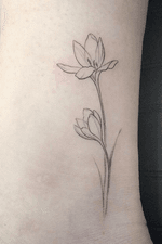Flower lily fine-line tattoo