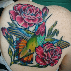 Flower and Hummingbird by Serina @twiggytattooer on IG 