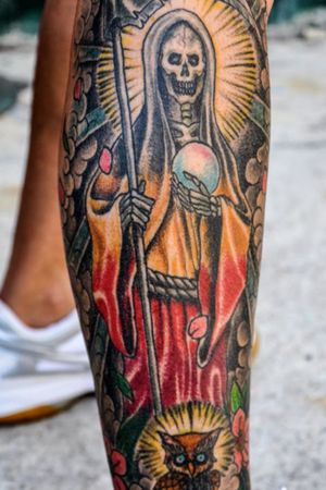 La Santísima Muerte. Her cloak colors Red being love and yellow or Amber being addiction. I've been a Santa Muertista for 9 years and I've owed her this for too long! 