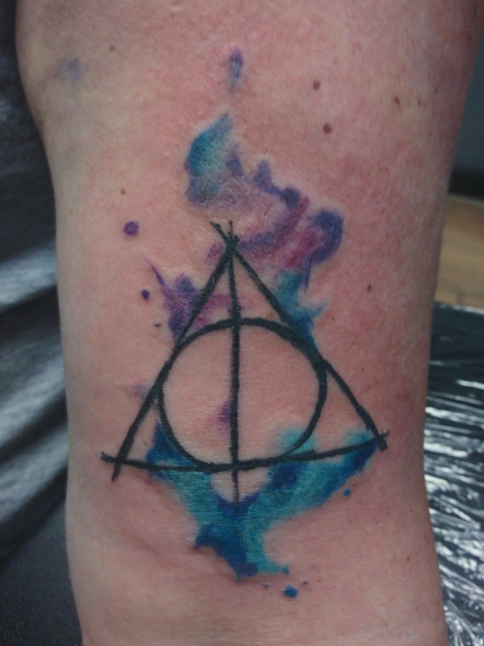 Colorful deathly hallows tattoo  Tattoogridnet
