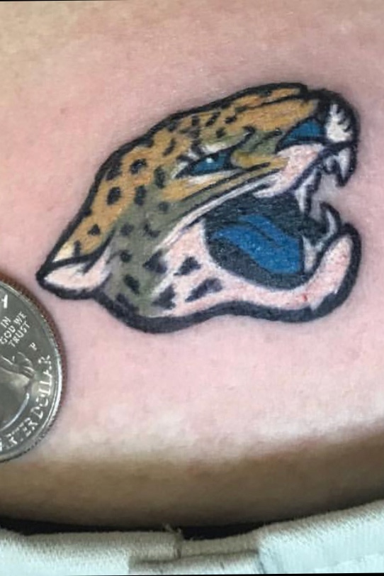 NFL star Adam Gotsis reveals crazy threefoot tattoo on his back and BUM  ahead of new Jaguars season  The Sun