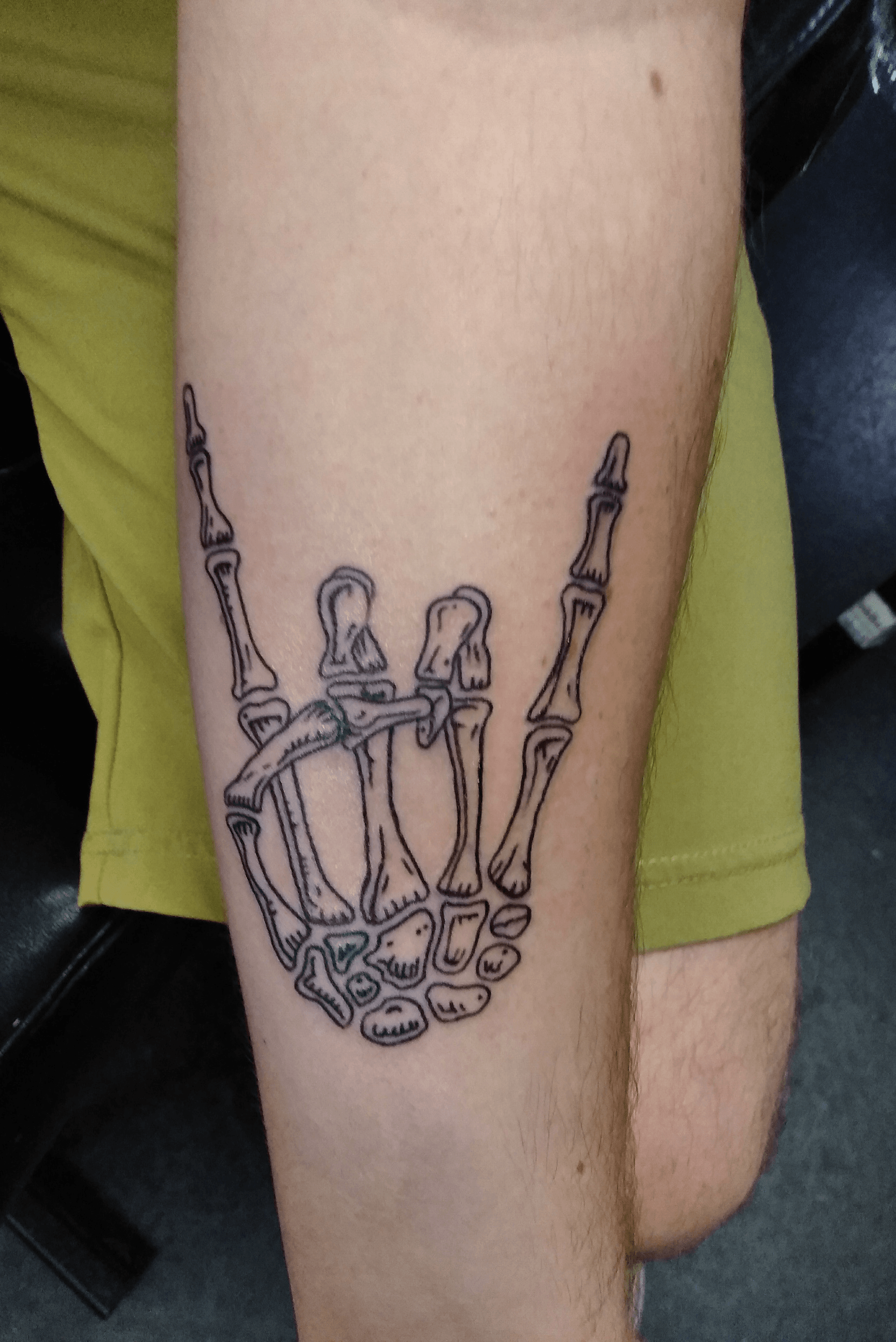 Tattoo Uploaded By Grant Bickham • Skeleton Rock On Hand • Tattoodo