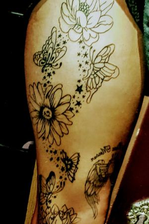 Butterfly and stars thigh tattoos