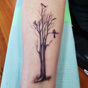 Tree of life with 3 little birds