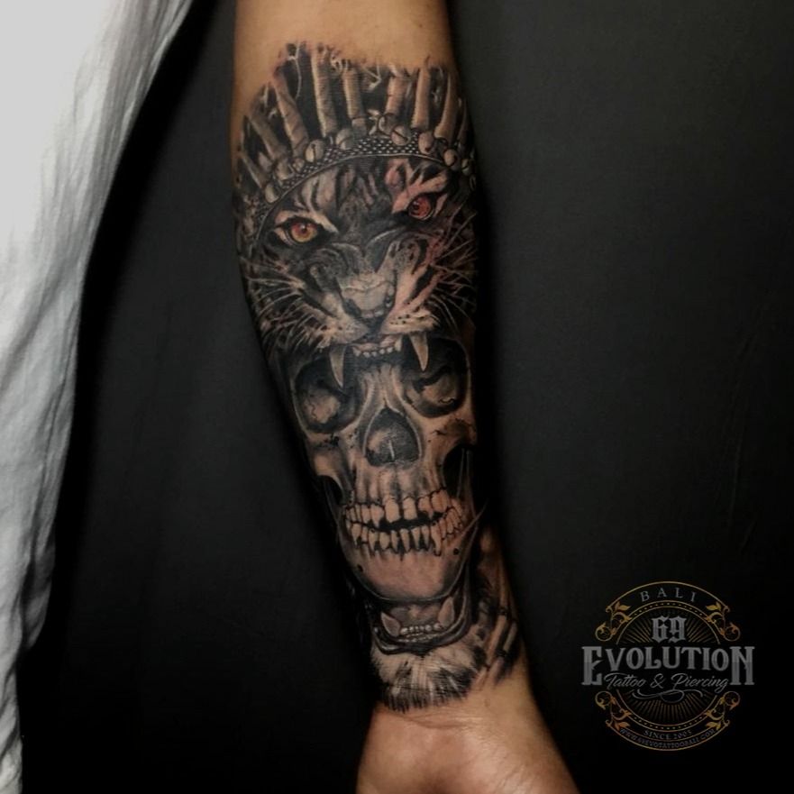 Tattoo uploaded by 69 Evolution Tattoo Piercing • Skull and tiger tattoo  was done by our artist. . . Get your tattoo or piercing only at 69  Evolution Tattoo & Piercing. Info
