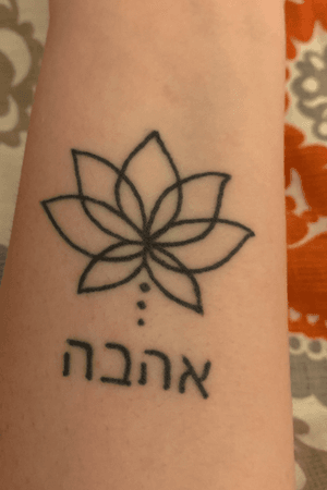 This is my tattoo its a lotus Underneath it says love in hebrew