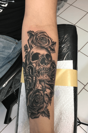 Black and grey skull tattoo