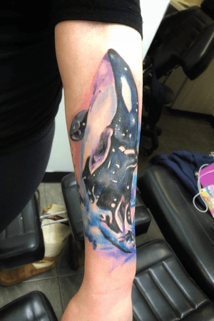 A beautiful Orca water color tattoo