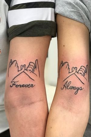 Pinky promise with freehand lettering on sisters