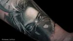 Gangsta girl tattoo portrait by tattoo artist Alexei Mikhailov. The black and grey realistic tattoo. #tattoo #tattoogangsta #tattoopostrait #realistictattoo #tattooartist #alexeimikhailov #alexeitattoo #tattooer #tatu #realism #portrait 