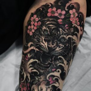 Tattoo by Fibs #Fibs #tattoodoambassador #blackandgrey #Japanese #tiger #junglecat #waves #cherryblossoms #flower #floral #nature