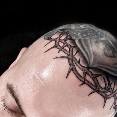 Tattoo by Rose Hardy #RoseHardy #tattoodoambassador #blackandgrey #thorns #crownofthorns #realism #realistic #headtattoo #scalptattoo