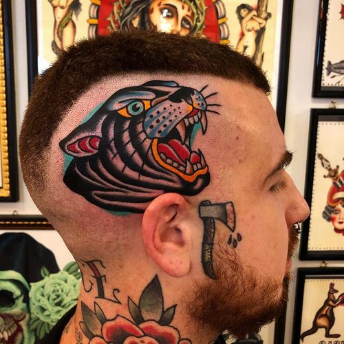 Tattoo by Samuele Briganti #SamueleBriganti #tattoodoambassador #color #traditional #panther #cat #junglecat #scalptattoo #headtattoo