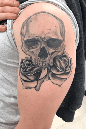 Skull and roses healed from over a year ago