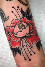 Tattoo by Steve Zimovan. #peony #flower #flowers #brightandbold #traditional #traditionaltattoo #ashevillenc #ashevilletattoos 