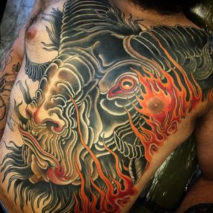 Tattoo by Derek Noble #DerekNoble #firetattoos #fire #flame #burning #element #neotraditional #bison #animal #chestpiece