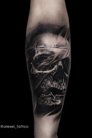 Tattoo skull in a realistic style by tattoo artist Alexei Mikhailov.  Black and white tattoo. #tattoorealistic #tattoorealism #tattoos #tattooskull #skulltattoo #tattoorealist #tattooart #tatuajes #tatuaze 