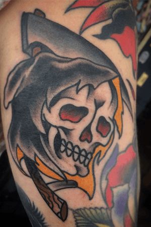 Tattoo by skull of ages