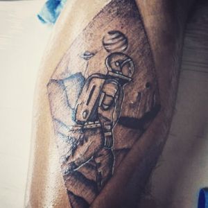 Un tatuaje de astronauta 