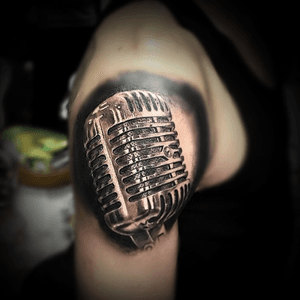 Old school microphone in black and grey 