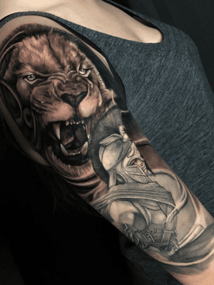 Lion and spartin tattoo 