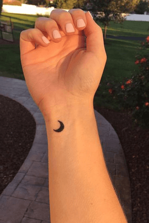 Moon on wrist