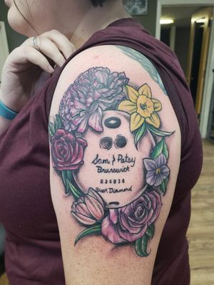 Beautiful memorial piece for my client Chelsea.#brunswick #bowling #bowlingtattoo #bishoprotary #tulips #roses #daffodils #floraltattoos 