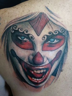 Evil female clown face.