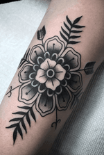 Tattoo by Steve Zimovan. #mandala #flower #flowers #arrow #blackandgrey #blacktattoo #blackwork #brightandbold #traditional #traditionaltattoo #ashevillenc #ashevilletattoos 