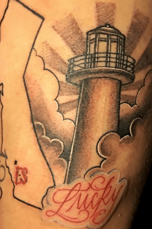 California Outline/ Long Beach lighthouse w/ the name “Lucky” #lettering #california #lighthouse #clouds #wip  Instagram: _TattoosByLoco