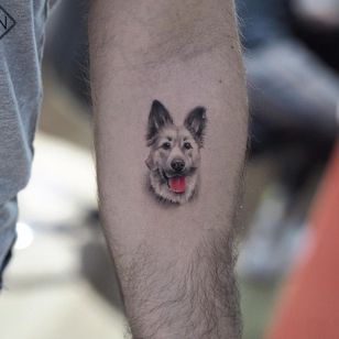 Tattoo by Jefree Naderali #JefreeNaderali #realisticanimaltattoos #realisticanimal #realistictattoo #animal #animaltattoos #nature #dog #petportrait #blackandgrey