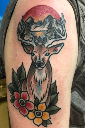 Traditional deer head tattoo