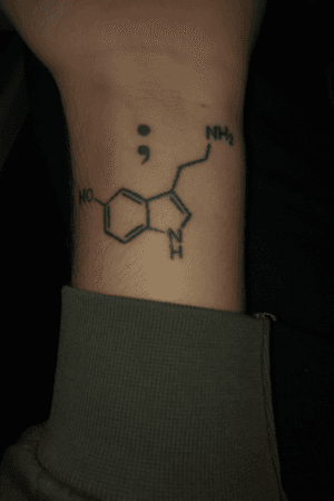Semi-colon for suicide/depression awareness and the chemical formula for Seratonin, the neurotransmitter largley responsible for mood and happiness.