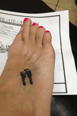 My 3rd tattoo                                                                   My daughter’s feetprint. I delivered her at 19 weeks. R.I.P. Aala Faye Sheikh 3-18-2013