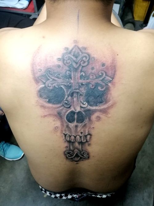 Skull and cross tattoo Wildchild la union tattoo studio we accept ✅ piercing and body modification ✅ custom works tattoo ✅ portrait tattoo ✅ Japanese tattoo ✅ water color tattoo ✅ black and gray tattoo ✅ colord tattoo ✅ cosmetic tattoo ✅ tribal tattoo ✅ tattoo removal  Wildchild tattoo studio.  Located @ tn arcade building gov. Ortega st San fernando la union  member of Philtag certified by D.o.h Visit our page ✅ Wildchild la union tattoo studio 1994  or call for appointment ✅09206704238 #philtag #mad #philtaglaunio #launiontattooatudio #wildchildlauniontattoostudio