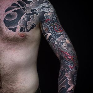Tattoo by Sergey Buslaev #SergeyBuslaev #tattoodoambassador #Japanese #Japanesetattoo #Irezumi #dragon #waves #clouds #fire