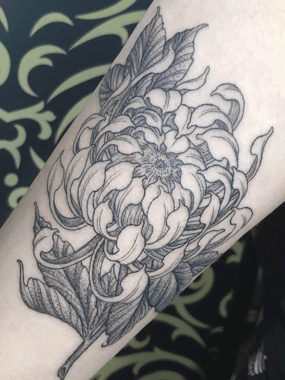 Chrysanthemum on back of the arm