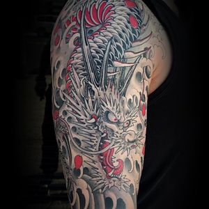 Tattoo by Matt Beckerich #MattBeckerich #tattoodoambassador #Japanese #Japanesetattoo #Irezumi #waves #dragon #blackandgrey