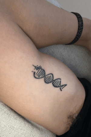 Simple DNA Strand, done at Untamed Piercings and Tattoos in Bellingham, MA