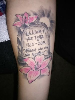 My cousin tattooed this tombstone for my dad on me.