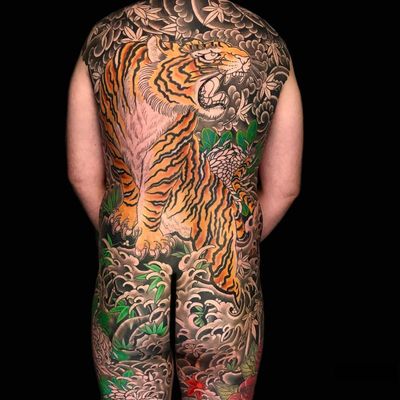 Tattoo by Henning Jorgensen #HenningJorgensen #tattoodoambassador #Japanese #Japanesetattoo #Irezumi #tiger #waves #leaves #nature #junglecat #cat