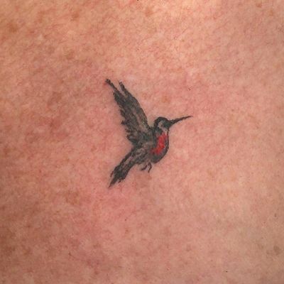 A tiny humming bird tattoo. 2cm. #bird #hummingbird #hummingbirdtattoo 