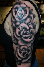 Traditional roses on an arm