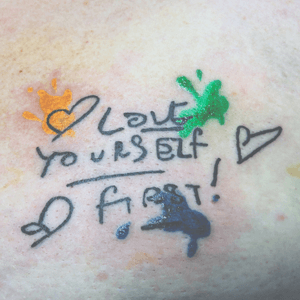 Tattoo by  “Upstairs” tattoo image