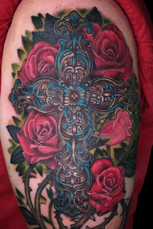 Cross and roses, some fresh and some healed