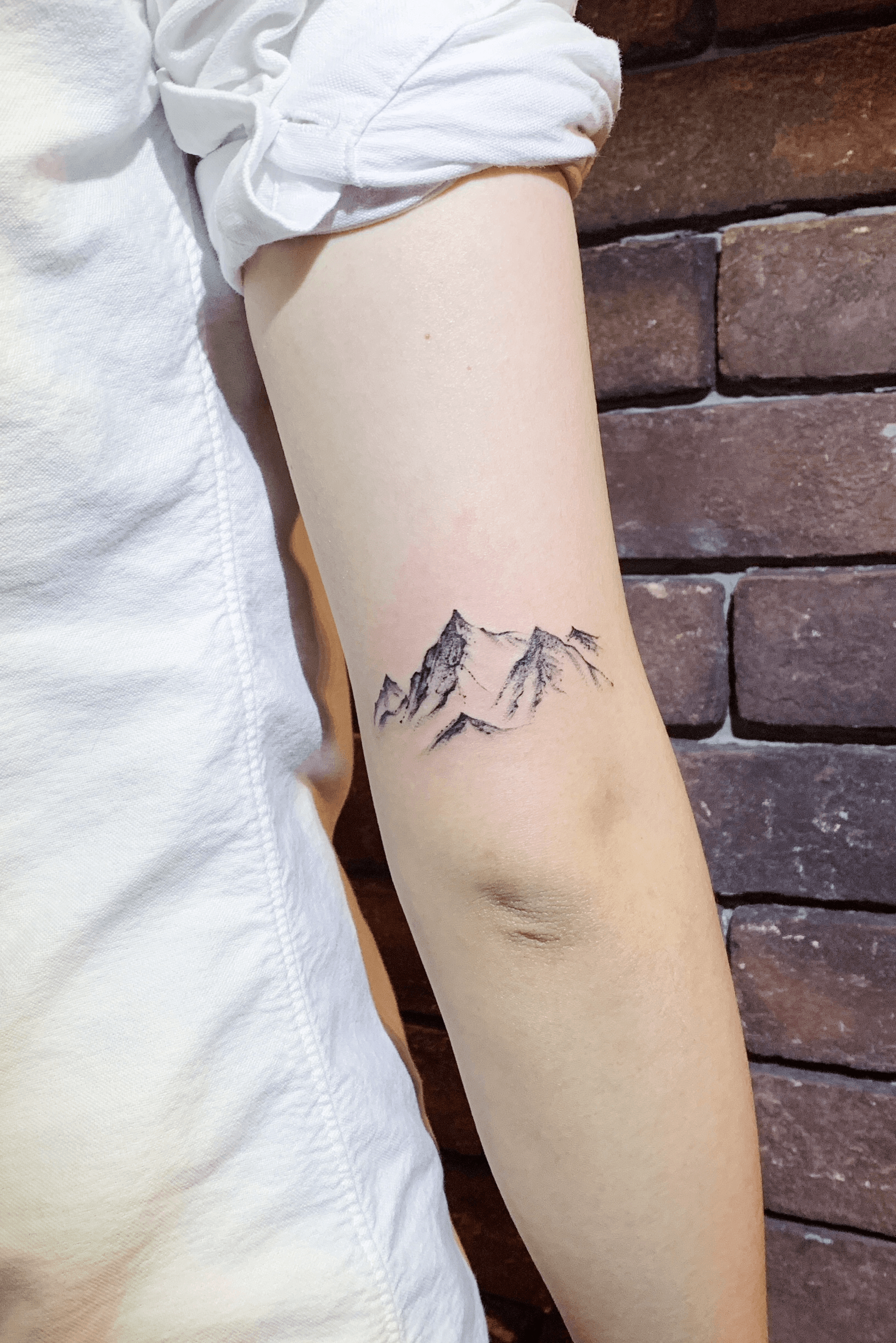 Top 47 Minimalist Mountain Tattoo Ideas 2021 Inspiration Guide   Geometric mountain tattoo Mountain tattoo simple Tattoo designs men