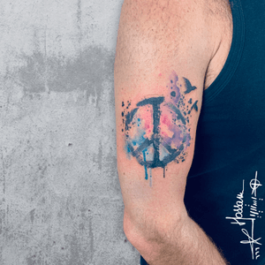 Peace sign tattoo