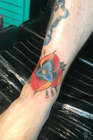 Music tattoo for band La Dispute. Mix of 2 flowers a rose and a apple blossom. #ladispute #flower #legtattoo #ankletattoo #color 