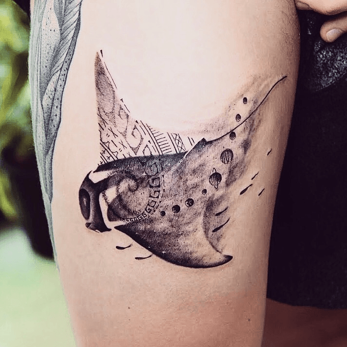 Spotted eagle ray tattoo on the forearm