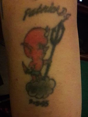 My Sons Tat and Birth date. I had this done at Express Yourself Tattoo Shop in Croydon, Pa back in February 2002.